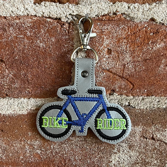 Blue Bike Rider Backpack Keychain